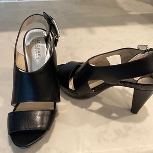 Black Michael Kors 4”heels. Never worn.